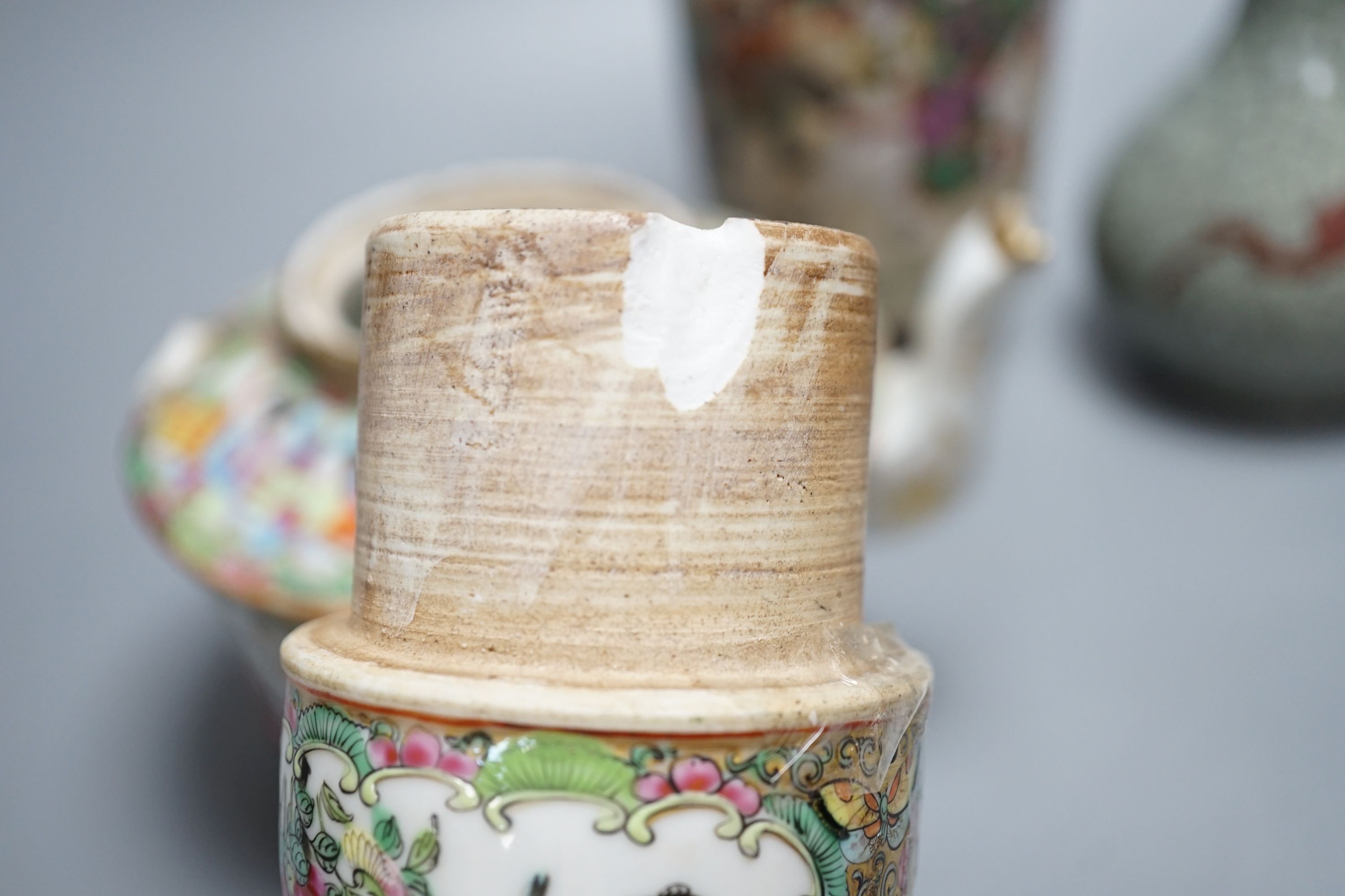 A Chinese famille rose crackleglaze vase, 29cm, together with a famille rose teapot and a crackleglaze celadon ground bottle vase